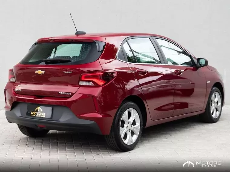 Chevrolet Onix Vinho 10