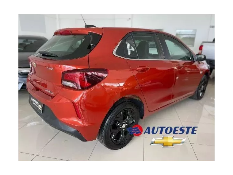 Chevrolet Onix Vinho 6