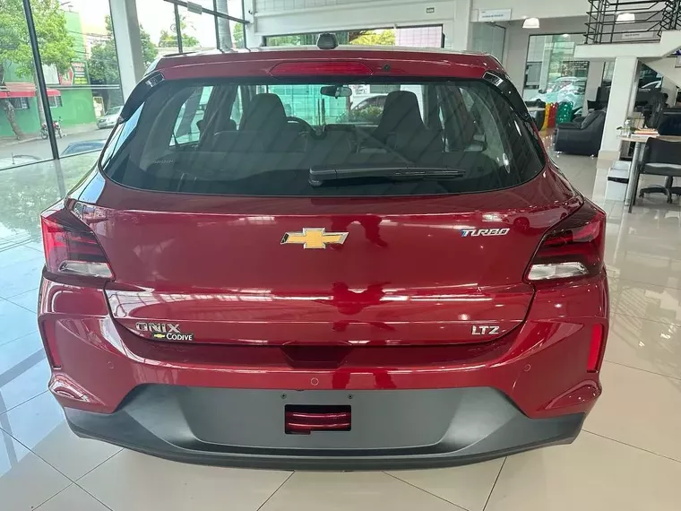 Chevrolet Onix Vermelho 6