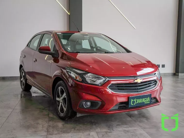 Chevrolet Onix Vinho 11