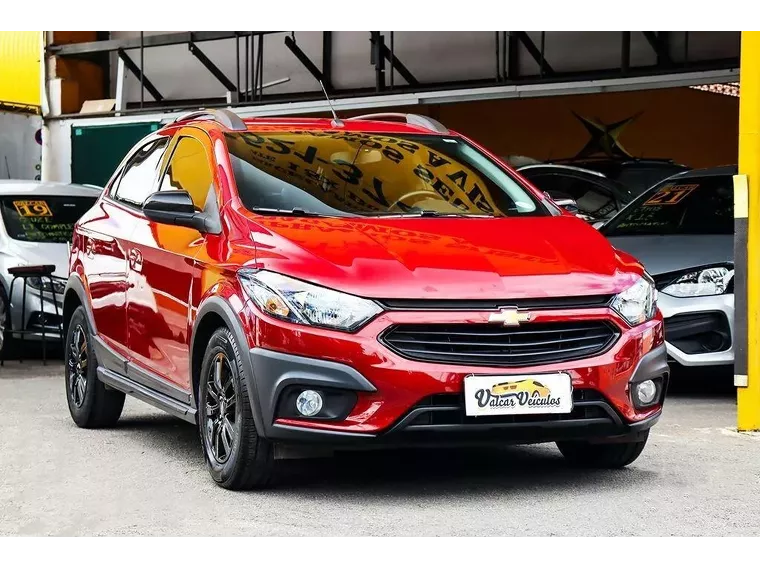 Chevrolet Onix Vinho 13