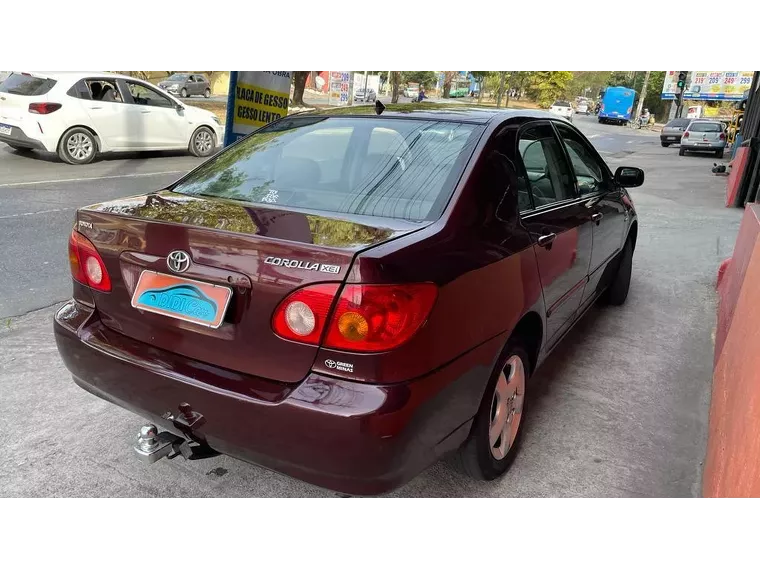 Toyota Corolla Vermelho 4