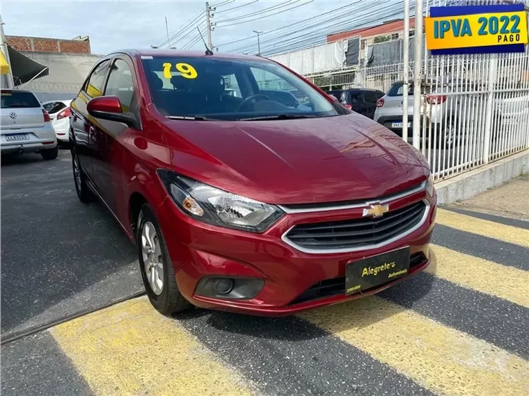 Chevrolet Onix Vinho 5