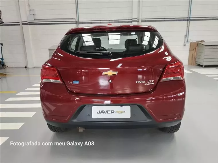 Chevrolet Onix Vermelho 7