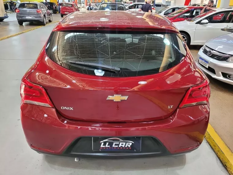 Chevrolet Onix Vermelho 6