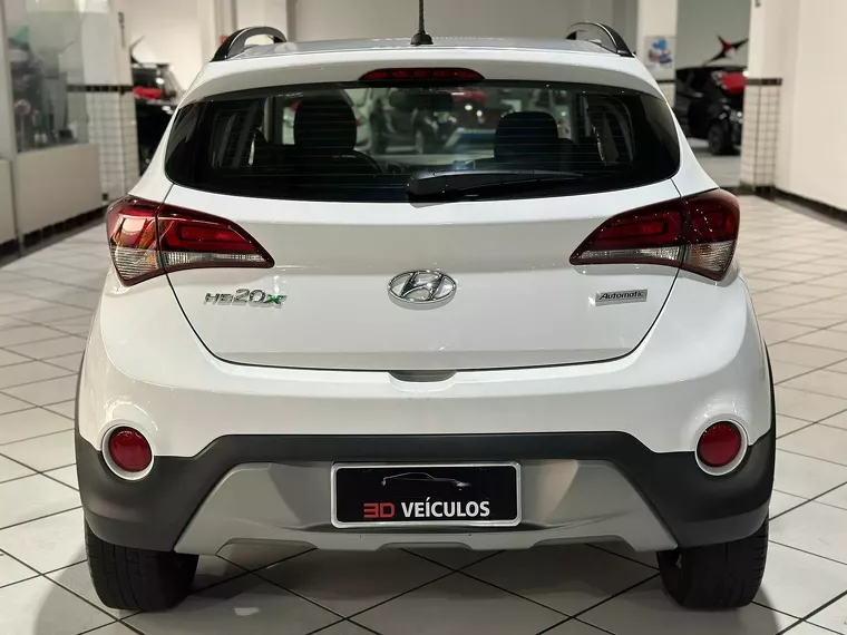 Hyundai HB20X Dourado 9