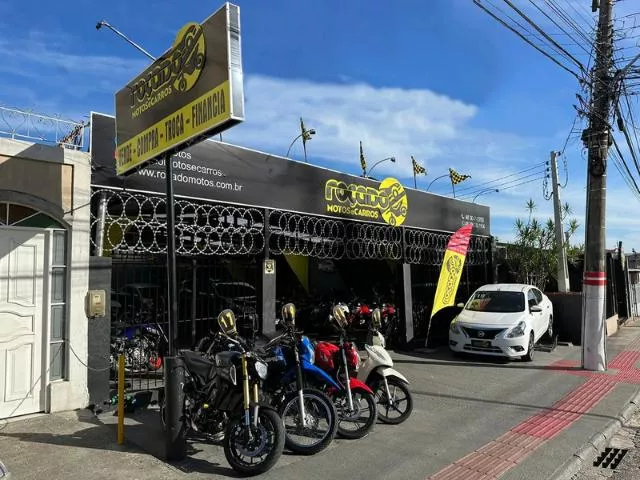 logo Roçado Motos E Carros