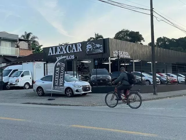 logo Alexcar Veículos