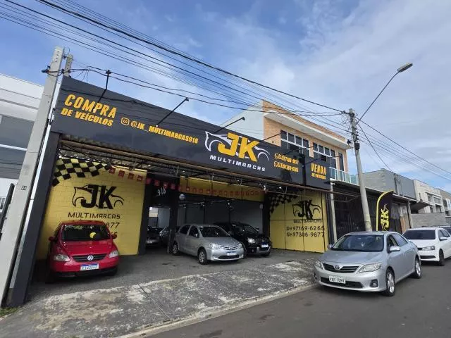 logo JK Multimarcas e manutenção e reparação de máquinas em geral ltda
