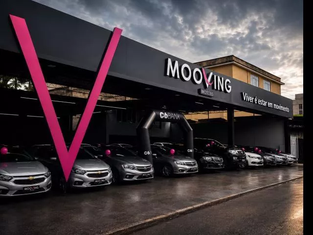 logo Mooving motors comércio de veículos Vr ltda